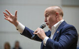 Then US House Representative Max Rose speaks to constituents during a town hall meeting, October 2, 2019, at the Joan and Alan Bernikow Jewish Community Center in the Staten Island borough of New York. (AP Photo/Mary Altaffer)