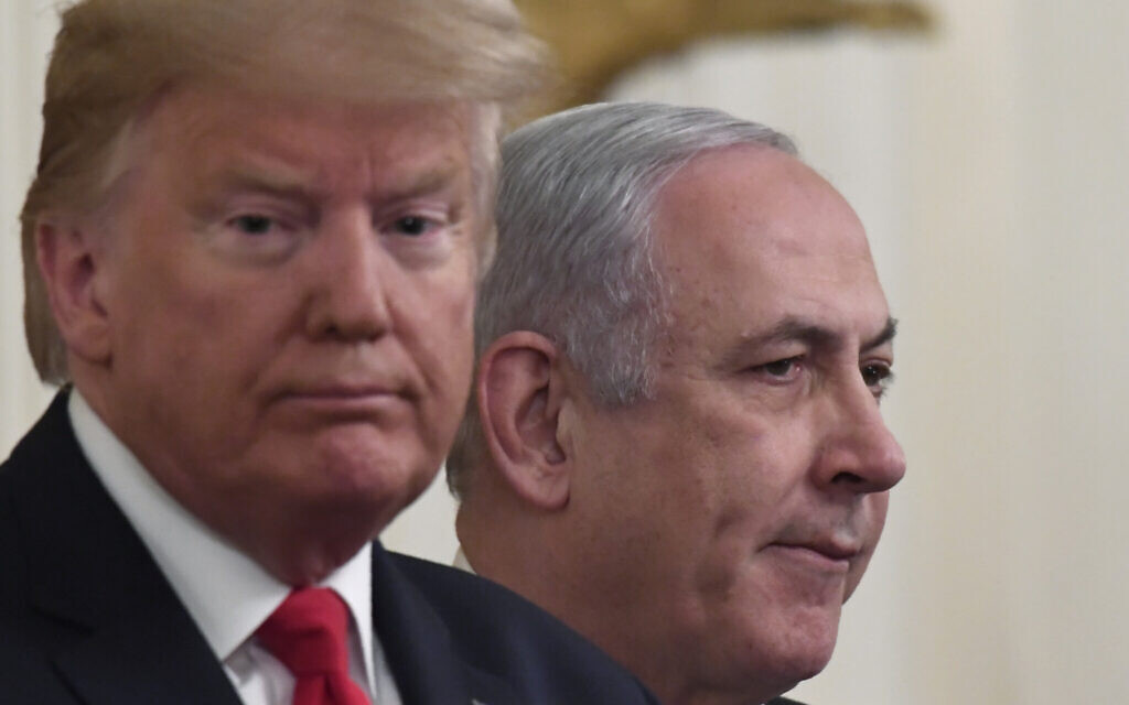 President Donald Trump and Prime Minister Benjamin Netanyahu during an event in the East Room of the White House in Washington, Tuesday, Jan. 28, 2020, to announce the Trump administration's much-anticipated plan to resolve the Israeli-Palestinian conflict. (AP Photo/Susan Walsh)