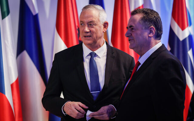 Blue and White leader Benny Gantz, left, with Likud party member and Foreign Minister Israel Katz at the President's Residence in Jerusalem as President Reuven Rivlin hosts over 40 world leaders as part of the World Holocaust Forum, on January 22, 2020. (Olivier Fitoussi/Flash90)