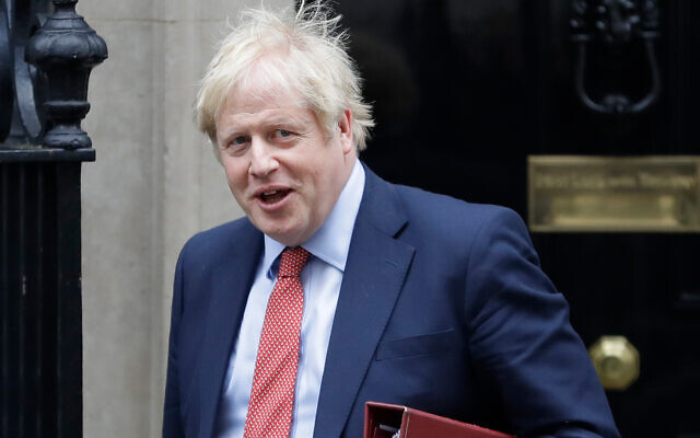 Britain's Prime Minister Boris Johnson leaves 10 Downing Street to attend the weekly session of Prime Ministers Questions in Parliament in London, Jan. 22, 2020. (AP/Kirsty Wigglesworth)