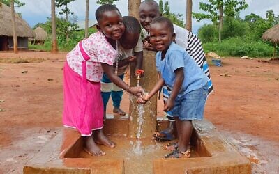 Children in Africa benefit from safe drinking water thanks to Israeli technology brought to them via the nonprofit Innovation Africa. (courtesy)