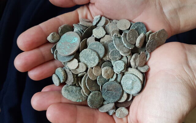 From the trove of coins found in the home of a suspected antiquities thief from Kfar Kana, January 2020. (Yaron Bibas/IAA)
