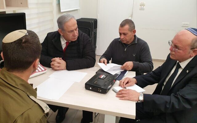 Prime Minister Benjamin Netanyahu, Shin Bet chief Nadav Argaman and National Security Adviser Meir Ben-Shabbat hold consultations on February 24, 2020. (Government Press Office)