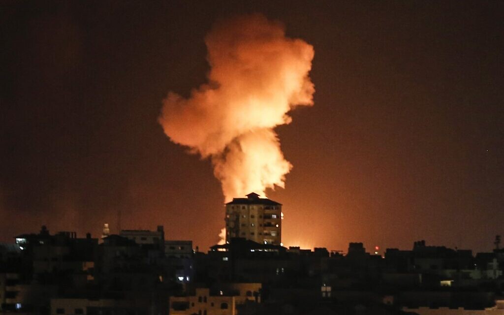 An explosion is seen following an Israeli airstrike on Gaza City in response to the firing of rockets by Palestinian terrorists in the coastal enclave toward Israel, February 24, 2020. (Mahmud Hams/AFP)