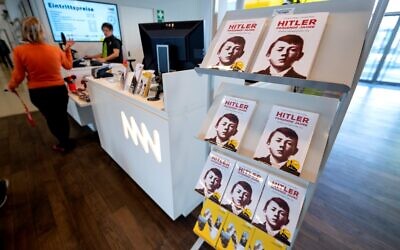 Copies of the biography that forms part of the exhibition are displayed for sale as part of the exhibition titled "The young Hitler, the formative years of a dictator" at the house of history in Sankt Poelten, Austria on February 27, 2020. (JOE KLAMAR / AFP)