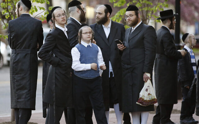 Illustrative image: Ultra-Orthodox Jews stand outside the New Jersey Center for the Performing Arts (NJPAC) while waiting for the start of a Yiddish performance, Wednesday, April 24, 2019, in Newark, New Jersey. (AP Photo/Kathy Willens)