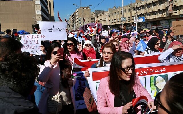 Women take part in a protest in Tahrir Square, Baghdad, Iraq, February 13, 2020. (AP Photo/Khalid Mohammed)