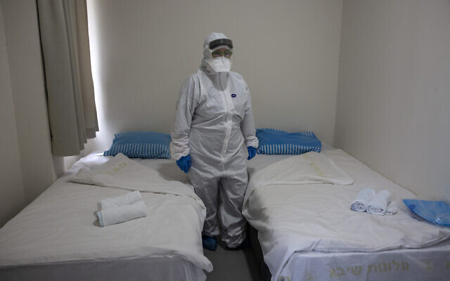 Israeli Professor Galia Rahavm, head of infectious diseases, shows one of the rooms where returning Israelis with suspected exposure to Coronavirus will stay under observation and isolation, at the Chaim Sheba Medical Center at at Tel Hashomer in Ramat Gan, Israel, February 19, 2020. (Heidi Levine/Pool via AP).