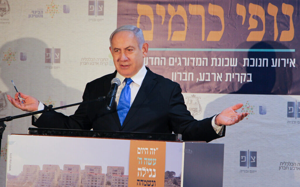 Prime Minister Benjamin Netanyahu seen during an inauguration ceremony of a new neighborhood in the Kiryat Arba settlement on February 23, 2020. (Gershon Elinson/Flash90)