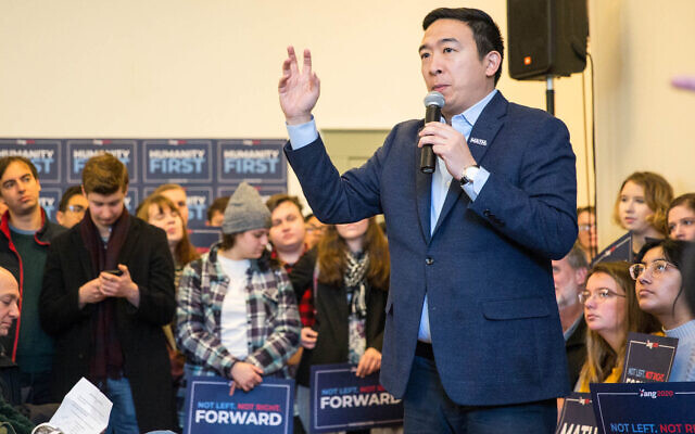 Democratic presidential candidate Andrew Yang speaks at a town hall in Hopkinton, New Hampshire, February 9, 2020. (Scott Eisen/Getty Images via JTA)