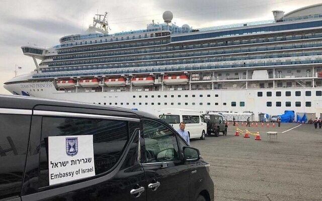 An embassy vehicle waits for Israeli passengers to leave the Diamond Princess cruise ship where they spent two weeks in quarantine due to an outbreak of the coronavirus on board, February 20, 2020. (Israeli Embassy Tokyo)