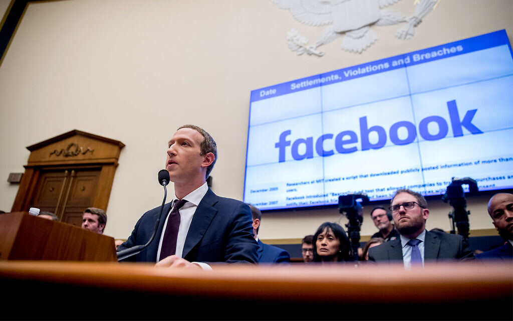 Facebook CEO Mark Zuckerberg testifies before a House Financial Services Committee hearing on Capitol Hill in Washington, Oct. 23, 2019. (AP Photo/Andrew Harnik)
