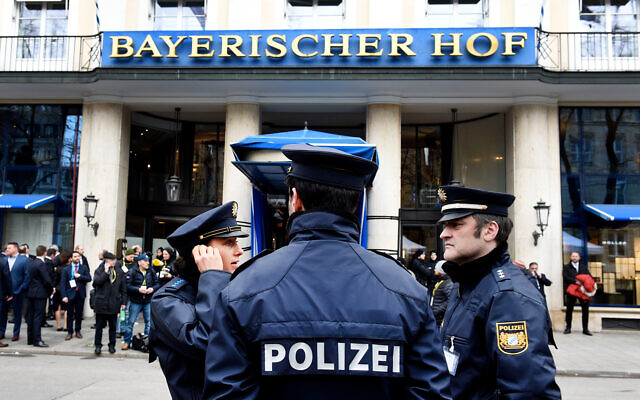 German police officers stand in front of the Bayerischer Hot hotel on the first day of the Munich Security Conference in Munich, Germany, Feb. 14, 2020. (AP/Jens Meyer)b