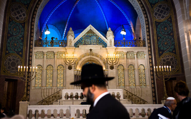 A rabbi arrives at a synagogue in Berlin to attend an event commemorating Kristallnacht, Nov. 9, 2018. (AP Photo/Markus Schreiber, file)
