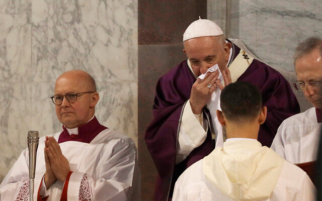 Pope Francis wipes his nose during the Ash Wednesday Mass opening Lent, Feb. 26, 2020. (AP/Gregorio Borgia)