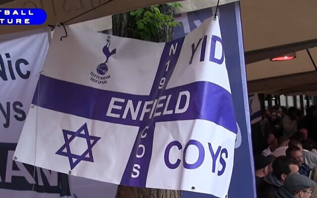 Tottenham Hotspur fans hold up a Yid sign at a soccer game. (Screen capture: YouTube)