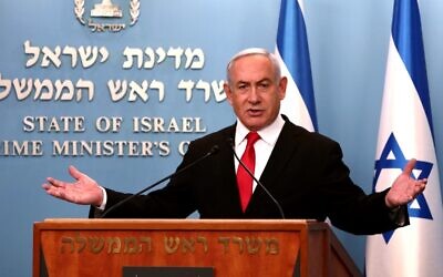 Prime Minister Benjamin Netanyahu delivers a speech at his Jerusalem office on March 14, 2020 (GALI TIBBON / POOL / AFP)