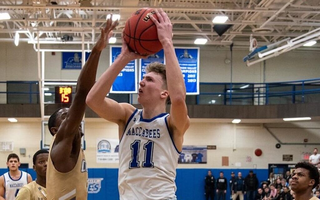 All-American first teamer Ryan Turell plays in a game for the Yeshiva University Maccabees. (Courtesy of Yeshiva University)