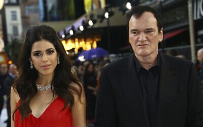 Writer and director Quentin Tarantino and his wife Daniella Pick pose for photographers upon arrival at the UK premiere for Once Upon A Time in Hollywood, at a central London cinema, July 30, 2019. (Photo by Joel C Ryan/Invision/AP)