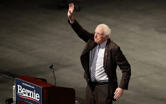Democratic presidential candidate Sen. Bernie Sanders, waves to supporters during a campaign rally March 9, 2020, in St. Louis. (AP Photo/Jeff Roberson)