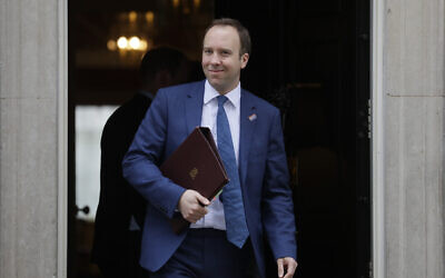 British lawmaker Matt Hancock, Secretary of State for Health and Social Care, leaves 10 Downing Street following a cabinet meeting ahead of the budget announcement in London, March 11, 2020 (AP Photo/Kirsty Wigglesworth)