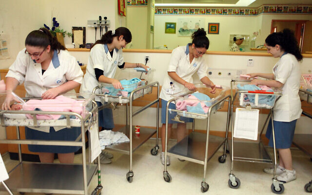 Illustrative: Jewish religious women do their national service at the maternity department at a hospital in Jerusalem. October 28, 2010. (Abir Sultan/FLASH90)