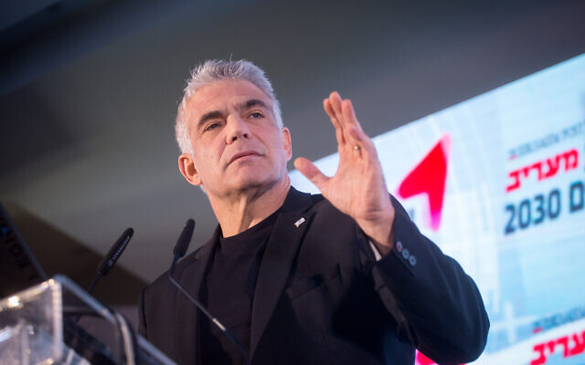 Blue and White MK Yair Lapid speaks at the Maariv conference in Herzliya, on February 26, 2020. (Miriam Alster/Flash90)