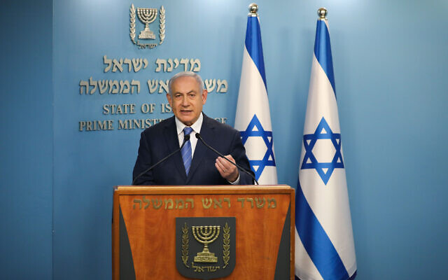 Prime Minister Benjamin Netanyahu speaks during a press conference about the coronavirus outbreak, at the Prime Minister's Office in Jerusalem on March 25, 2020. (Olivier Fitoussi/Flash90)