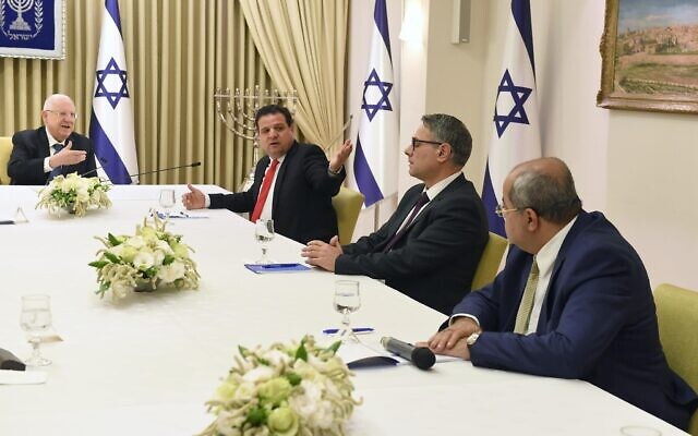 President Reuven Rivlin (L) meeting the leaders of the Joint List party (L-R) Ayman Odeh, Mtanes Shihadeh and Ahmad Tibi, at the President's Residence in Jerusalem on March 15, 2020. (Mark Neyman/GPO)