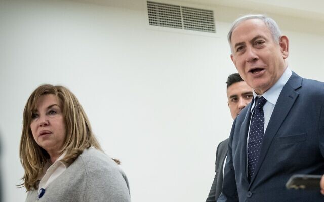 Rivka Paluch, left, walks alongside Prime Minister Benjamin Netanyahu in the Knesset on March 3, 2020. (Yonatan Sindel/Flash90)