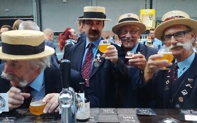Illutrative: Belgian drinkers enjoying Ginger Tipple, a kosher for Passover beer. (Courtesy Ginger Tipple)