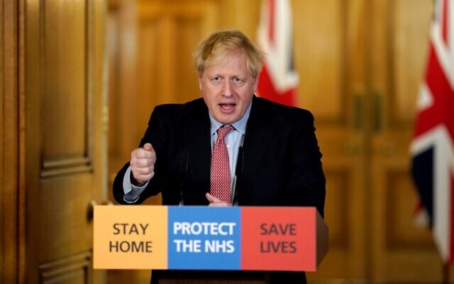 In this file photo taken on March 25, 2020 Britain's Prime Minister Boris Johnson speaks during a remote press conference to update the nation on the Covid-19 pandemic at 10 Downing Street in central London on March 25, 2020. (10 Downing Street / AFP)