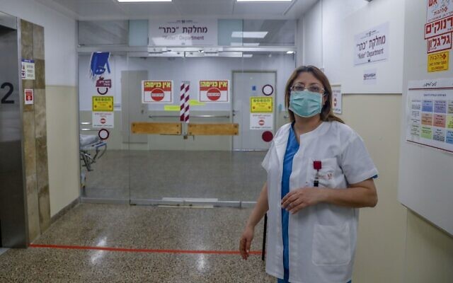Israeli Arab doctor Khitam Hussein, head of the COVID-19 response division at the Rambam Hospital near Haifa in northern Israel, poses for a photo during an interview at the medical center, on April 16, 2020. ( Ahmad GHARABLI / AFP)