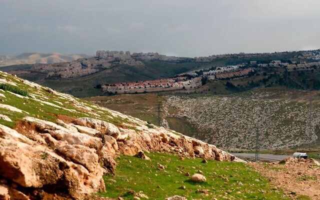 A picture taken from the controversial E1 corridor in the West Bank shows the Israeli settlement of Ma'ale Adumim in the background, Feb. 25, 2020. (Ahamd Gharabli/AFP)