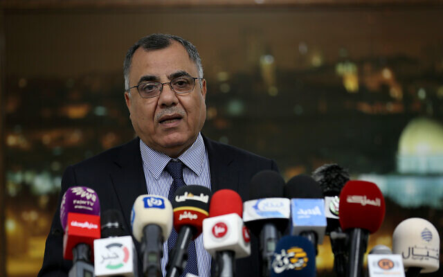 Palestinian Authority government spokesman Ibrahim Milhim speaks at a press conference in Ramallah on April 1, 2020. (Wafa)