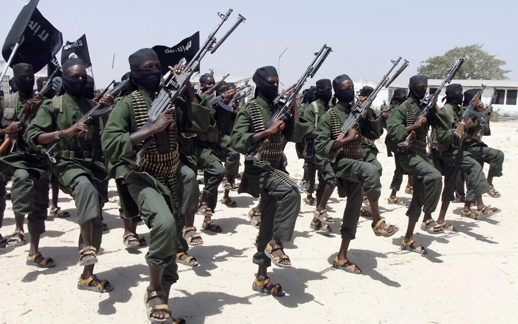 Hundreds of newly trained al-Shabab fighters perform military exercises in the Lafofe area south of Mogadishu, in Somalia, February 17, 2011. (AP Photo/Farah Abdi Warsameh, File)