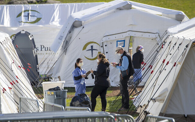 Medical personnel work at the emergency Samaritan’s Purse field hospital in New York’s Central Park, on April 1, 2020. (Mary Altaffer/AP)