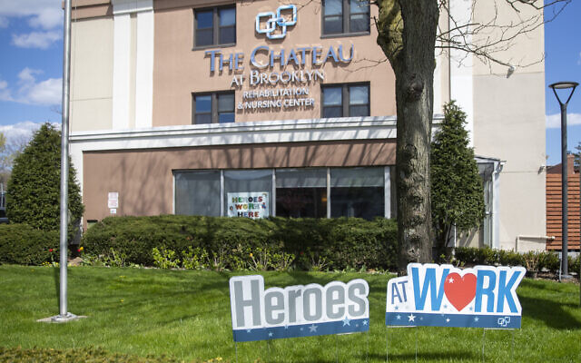 In this Wednesday, April 15, 2020 photo the Chateau at Brooklyn Rehabilitation & Nursing Center is seen in the Sheepshead Bay neighborhood of the Brooklyn borough of New York. (AP Photo/Mary Altaffer)
