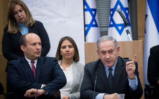 Prime Minister Benjamin Netanyahu, right, with Defense Minister Naftali Bennett during a meeting in the Knesset with the heads of right-wing parties, March 4, 2020. (Yonatan Sindel/Flash90)
