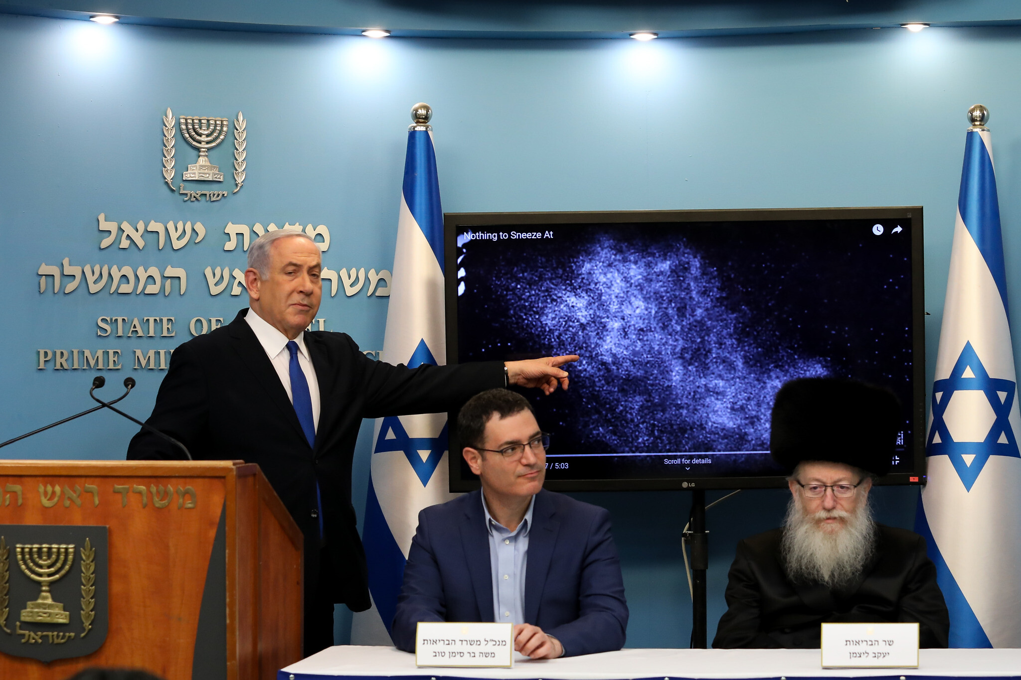 Prime Minister Benjamin Netanyahu (L), Health minister Yaakov Litzman (L) and Health Ministry Director General Moshe Bar Siman-Tov at a press conference about the coronavirus at the Prime Minister’s Office in Jerusalem on March 11, 2020. (Flash90)