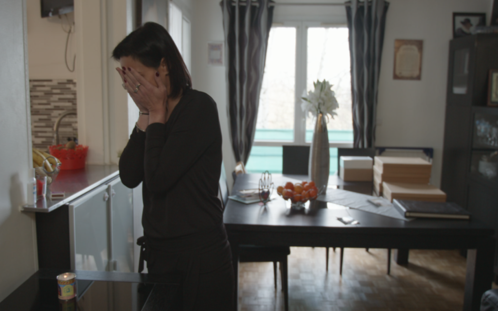 Valerie Braham, widow of one of the victims of the Hyper Cacher grocery store shooting in Paris, appears in “Viral: Antisemitism in Four Mutations.” (PBS via JTA)
