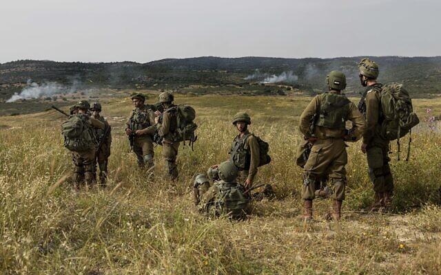 Illustrative: Israeli troops take part in a drill in northern Israel, May 13, 2020. (Tsafrir Abayov/AP)