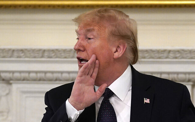 US President Donald Trump after a meeting with restaurant industry executives about the coronavirus response, in the State Dining Room of the White House, in Washington, May 18, 2020. (AP Photo/Evan Vucci)