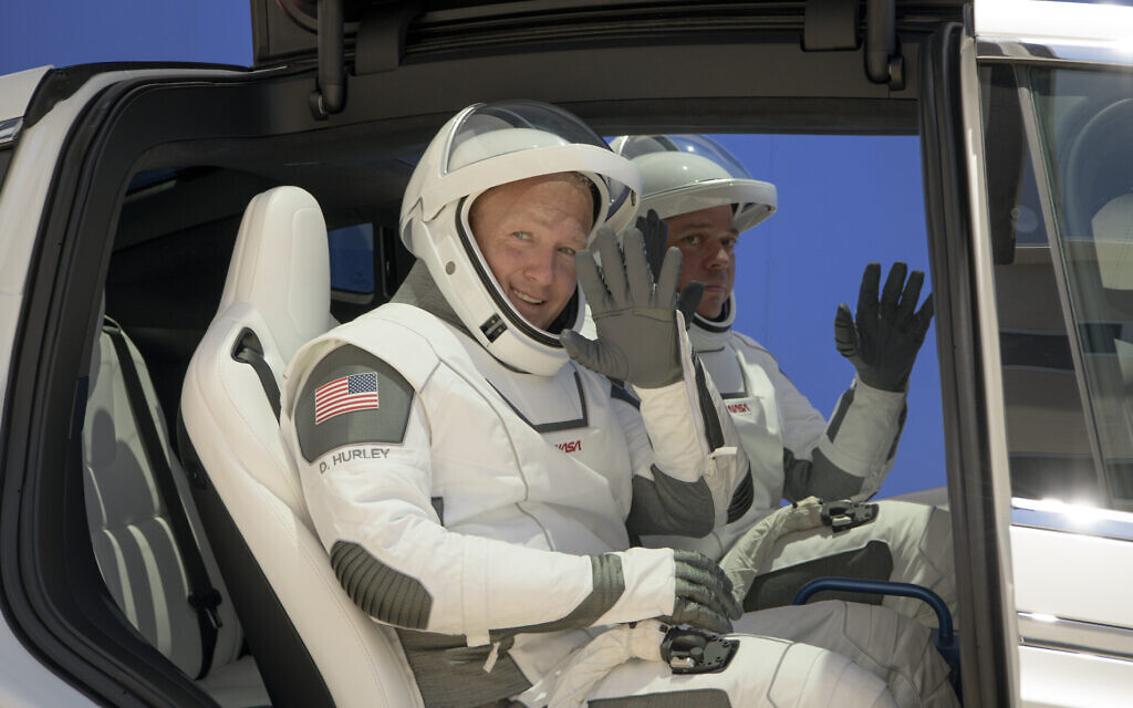2 US astronauts suit up for historic SpaceX launch | The ...
