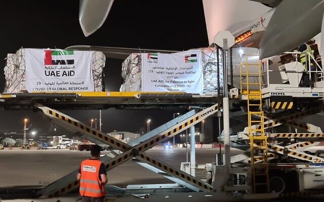 An Etihad Airways flight with aid for the Palestinians to fight the coronavirus pandemic is unloaded at Ben Gurion Airport on May 19, 2020. (Nickolay Mladenov/Twitter)
