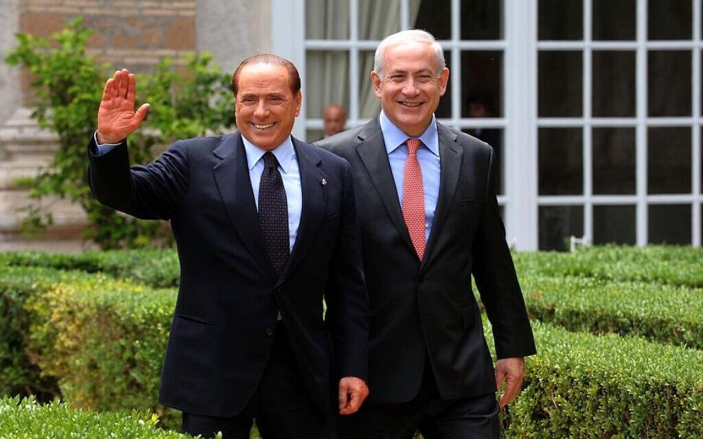 File: Benjamin Netanyahu, right, meets with then-Italian Prime Minister Silvio Berlusconi in Rome on June 13, 2011. (Amos Ben Gershom / GPO/FLASH90)