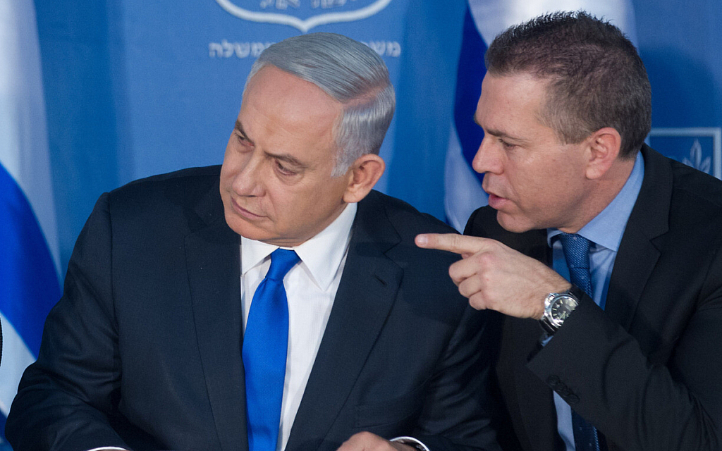Prime Minister Benjamin Netanyahu, left, and Gilad Erdan at an event for incoming police commissioner Roni Alsheikh, not pictured, in Jerusalem, on December 3, 2015. (Miriam Alster/FLASH90)