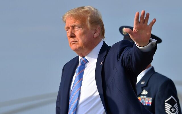 US President Donald Trump waves upon arriving at Joint Base Andrews in Maryland on June 14, 2020. (Nicholas Kamm/AFP)