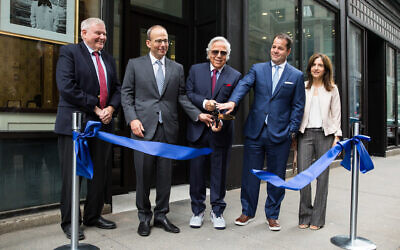 Robert Kraft, center, along with members of his family, celebrates the grand opening of the Kraft Family Building at the Combined Jewish Philanthropies of Greater Boston, April 27, 2018. (Combined Jewish Philanthropies of Greater Boston)