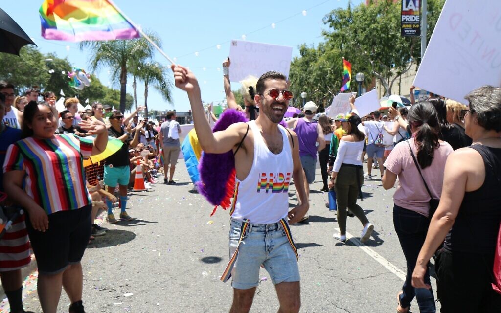 Arya Marvazy marching at the 2019 Los Angeles Pride Parade. (Anna Falzetta/ via JTA)